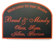 Custom sign with cursive letters painted red